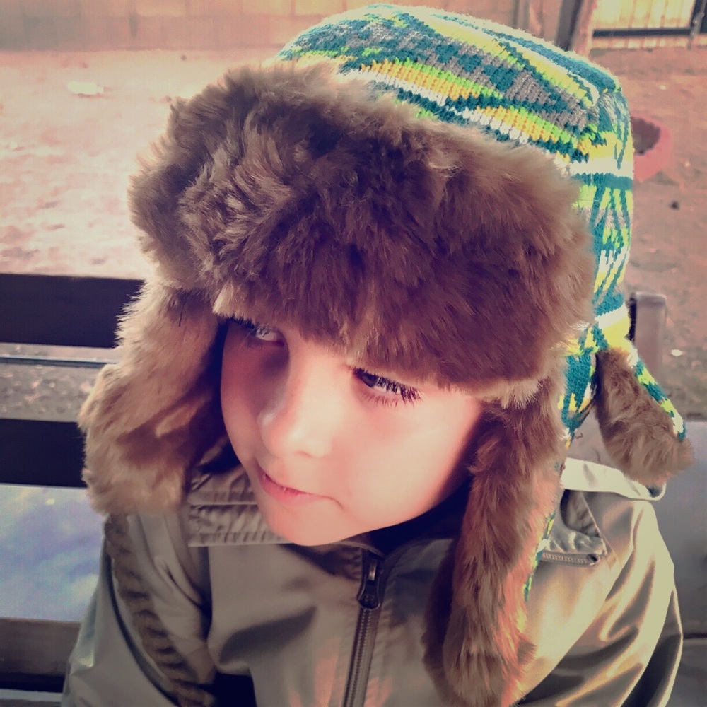Faux fur knitted hat with straps